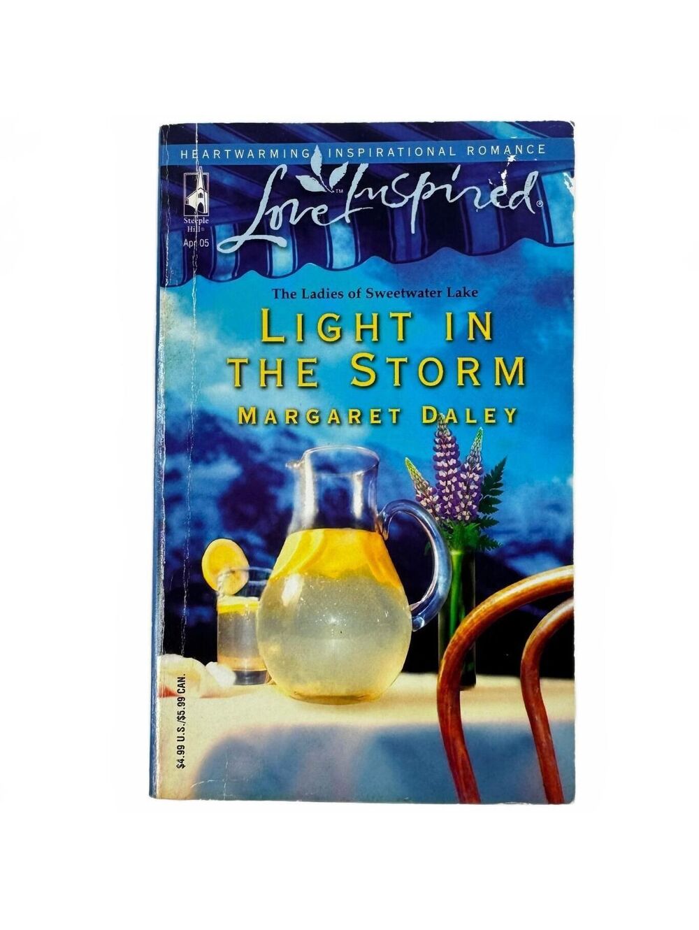 Light in the Storm by Margaret Daley (paperback)